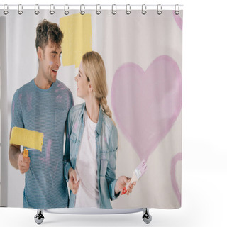 Personality  Happy Young Couple Looking At Each Other While Standing Near Pink Heart Painted On White Wall Shower Curtains
