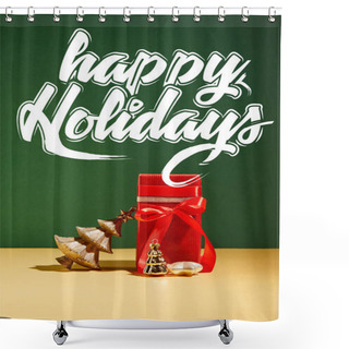 Personality  Red Gift Box And Decorative Christmas Tree With Golden Baubles On Green Background With White Happy Holidays Lettering Shower Curtains