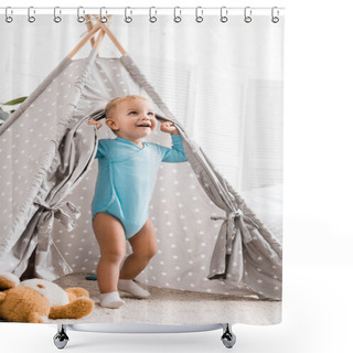 Personality  Cute Toddler Boy In Blue Bodysuit Smiling And Standing In Grey Baby Wigwam In Nursery Room Shower Curtains