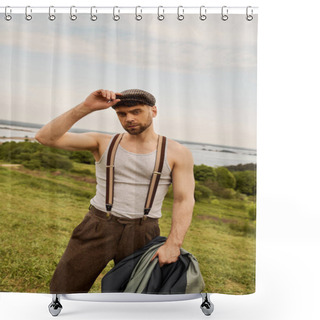 Personality  Trendy Bearded Man In Suspenders Touching Newsboy Cap And Holding Jacket While Looking At Camera With Rural Landscape At Background, Fashion-forward In Countryside Shower Curtains