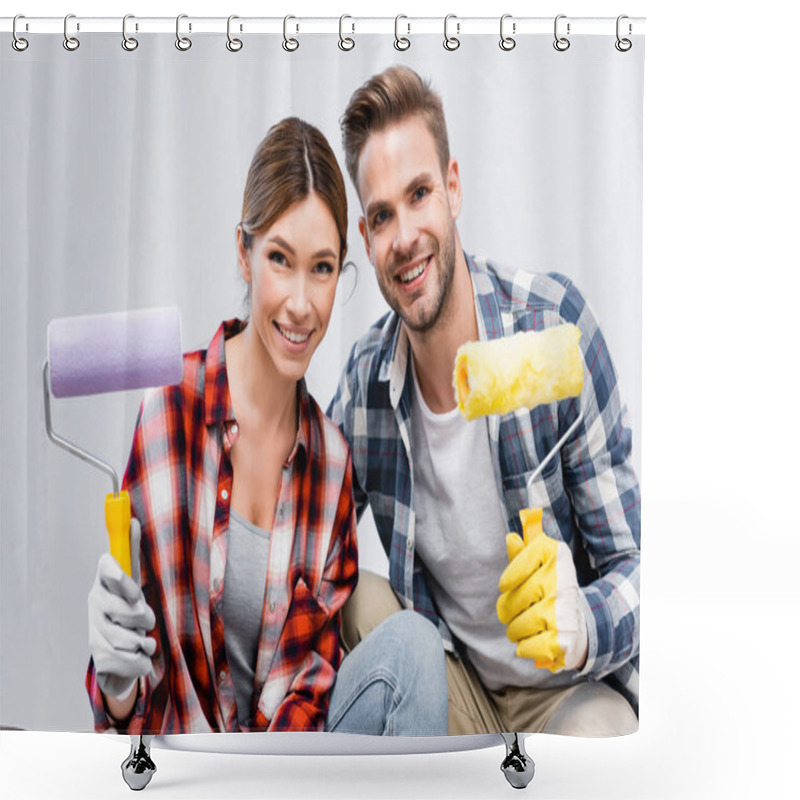 Personality  Happy Young Couple Looking At Camera While Holding Paint Rollers Shower Curtains