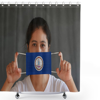 Personality  A Woman And Hygienic Mask With Virginia Flag Pattern In Her Hand And Raises It To Cover Her Face On Dark Grey Background. A Mask Is A Very Good Protection From Tiny Particle Or Virus Corona Or Covid 19. Shower Curtains