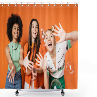 Personality  Excited And Cheerful Multiethnic Teen Girls With Bold Makeup Looking At Soap Bubbles While Posing And Standing On Orange Background, Teen Fashionistas With Impeccable Style Concept Shower Curtains