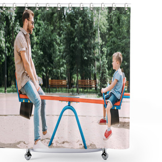 Personality  Side View Of Father And Son Having Fun On Swing At Playground In Park Shower Curtains