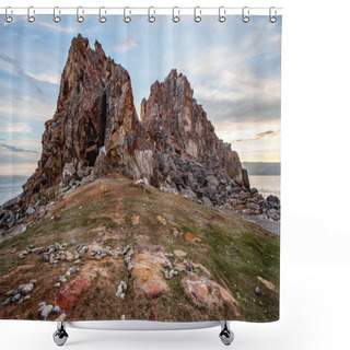 Personality  View Of The High Rocky Stones Of The Shamanka Rock Against The Sky With Clouds On Lake Baikal. There Are Stones Everywhere On Earth. The Ground Is Covered With Grass. The Sacred Place Of The Island Of Olkhon. Shower Curtains