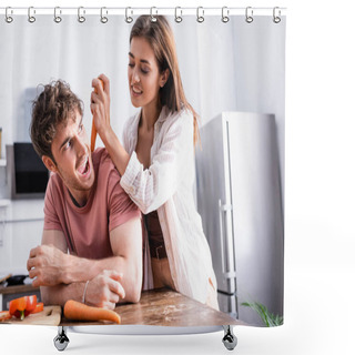 Personality  Smiling Woman Holding Carrot Near Excited Boyfriend In Kitchen  Shower Curtains