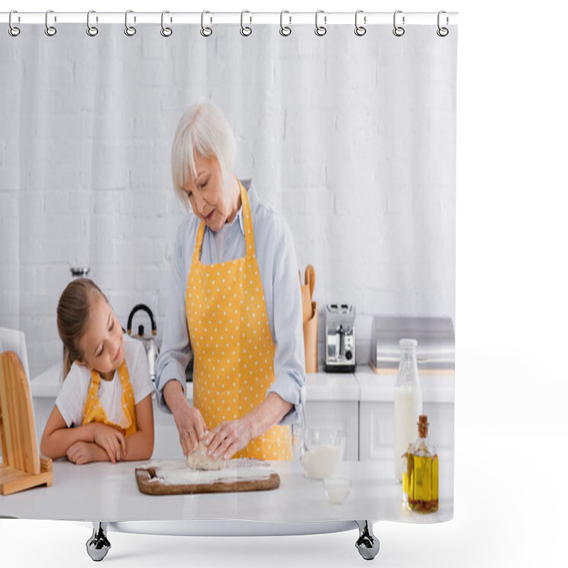 Personality  Kid looking at grandmother making dough near digital tablet and ingredients  shower curtains