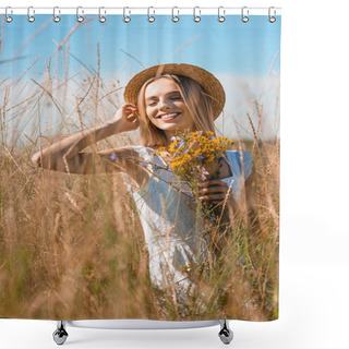Personality  Selective Focus Of Young Sensual Woman Touching Straw Hat While Holding Wildflowers In Grassy Field Shower Curtains