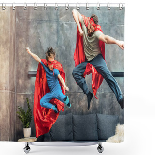 Personality  Father And Son In Superhero Capes And Masks Jumping On Sofa At Home Shower Curtains