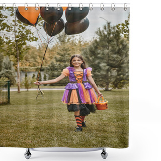 Personality  Cheerful Girl In Halloween Costume Holding Balloons And Candy Bucket While Walking On Green Grass Shower Curtains