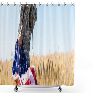 Personality  Panoramic Shot Of Patriotic Soldier In Military Uniform Holding American Flag While Standing In Field  Shower Curtains