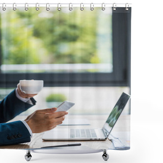 Personality  Cropped View Of Man Holding Cup And Smartphone Near Laptop  Shower Curtains