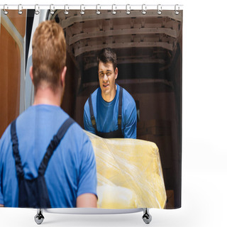 Personality  Selective Focus Of Loader In Uniform Holding Couch In Stretch Wrap With Colleague Near Truck Outdoors  Shower Curtains