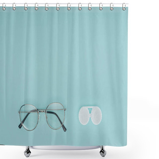 Personality  Top View Of Eyeglasses And Contact Lenses Container On Blue Background Shower Curtains