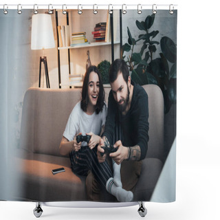 Personality  Selective Focus Of Beautiful Young Couple Sitting On Couch With Joysticks And Playing Video Game In Living Room Shower Curtains