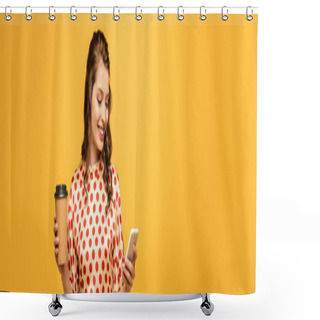 Personality  Panoramic Shot Of Happy Young Woman Holding Coffee To Go And Using Smartphone Isolated On Yellow Shower Curtains