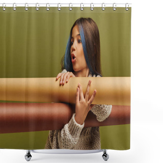 Personality  Shocked Preadolescent Girl With Dyed Hair Wearing Warm Knitted Sweater And Holding Rolled Papers While Standing And Posing Isolated On Green, Autumn Fashion For Preteens Concept Shower Curtains