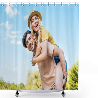 Personality  Low Angle View Of Happy Couple Piggybacking In Park Shower Curtains