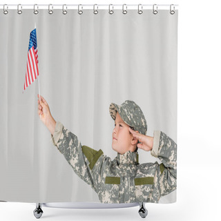 Personality  Portrait Of Boy In Camouflage Clothing Saluting And Looking At American Flagpole In Hand Isolated On Grey Shower Curtains