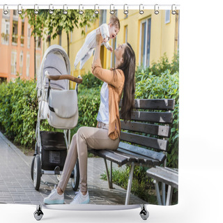 Personality  Side View Of Mother Holding Happy Baby On Bench Near Stroller Shower Curtains
