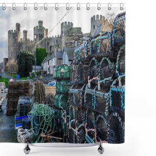 Personality  Conwy, UK : Jan 25, 2020: Lobster Pots Stacked Neatly On The Harbour Of Conwy. Shower Curtains