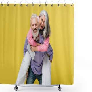 Personality  Cheerful Middle Aged Man Piggybacking Happy Asian Wife With Digital Tablet Isolated On Yellow  Shower Curtains