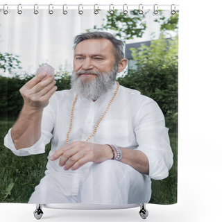 Personality  Senior Master Guru In White Shirt And Beads Looking At Selenite Crystal Outdoors Shower Curtains