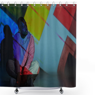 Personality  Trendy Man Sitting On Floor With Crossed Legs In Pink Hoodie In Projector Lights, Fashion Concept Shower Curtains