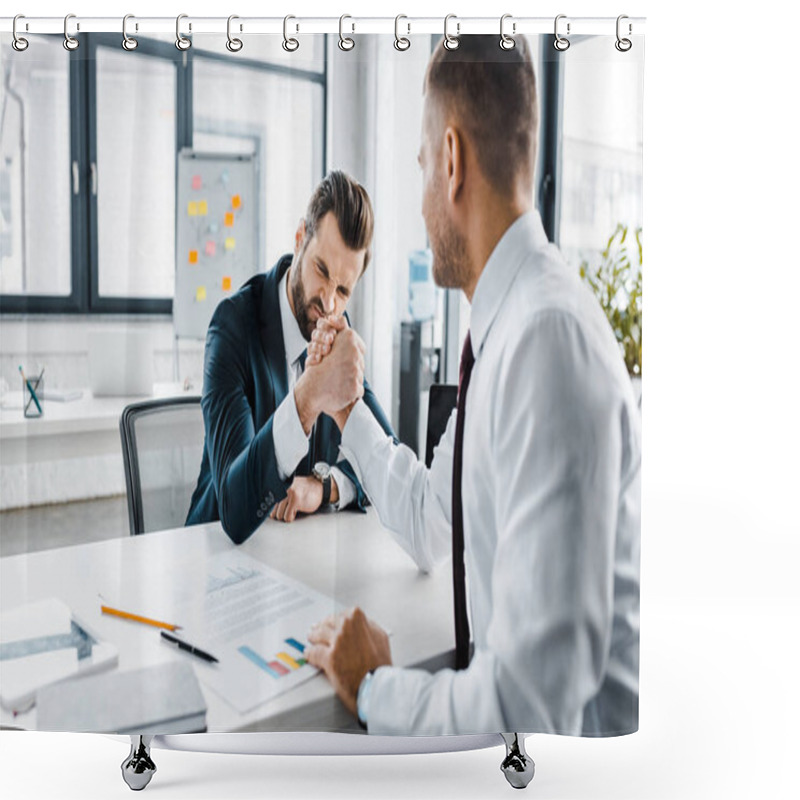 Personality  selective focus of handsome businessman competing arm wrestling with coworker in modern office  shower curtains