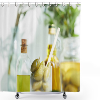 Personality  Closeup Shot Of Glass With Spoon And Green Olives, Jar, Various Bottles Of Aromatic Olive Oil With And Branches On Wooden Tray Shower Curtains