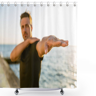 Personality  Close-up Shot Of Adult Sportsman Stretching Arm Before Training On Seashore Shower Curtains