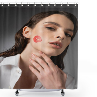 Personality  Portrait Of Brunette Woman With Red Kiss Print On Face Touching Neck And Looking At Camera On Grey Background Shower Curtains