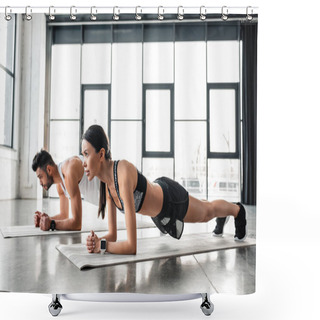 Personality  Side View Of Athletic Young Couple In Sportswear Doing Plank Exercise On Yoga Mats In Gym  Shower Curtains