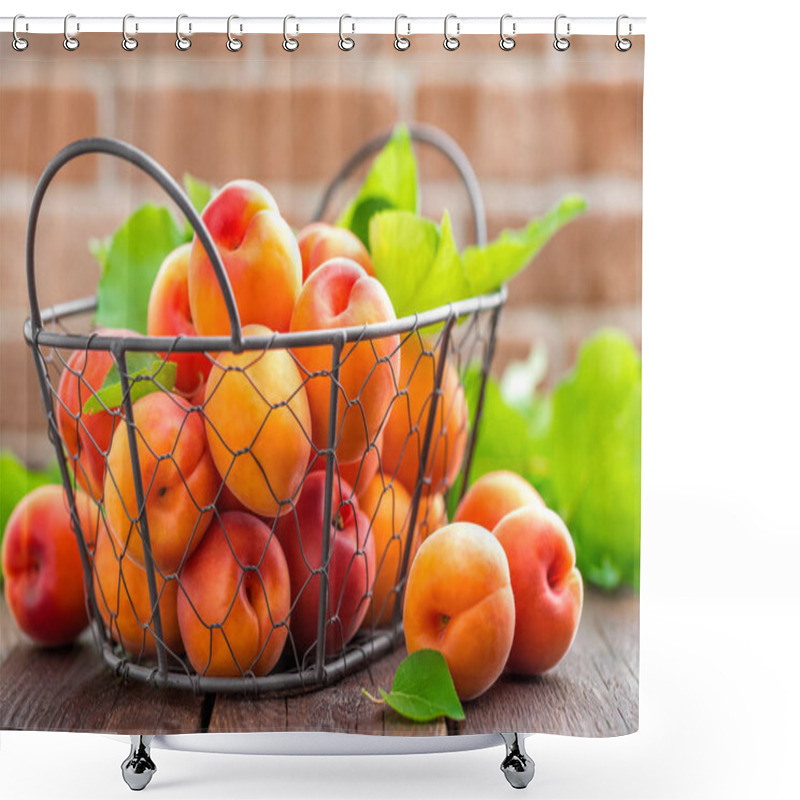 Personality  Fresh apricots with leaves in basket on wooden table shower curtains