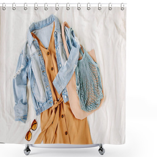 Personality  Blue Jean Jacket And  Beige Dress With Tote Bag On White Bed. Women's Stylish Autumn Outfit. Trendy Clothes. Flat Lay, Top View. Shower Curtains