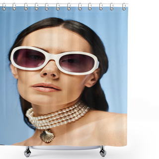 Personality  A Stylish Woman Wearing Sunglasses And A Pearl Necklace Poses In A Studio Against A Blue Background, Exuding A Glamorous Summer Vibe. Shower Curtains