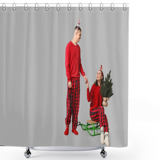 Personality  Happy Young Couple In Christmas Pajamas, With Sledge And Coniferous Tree On Grey Background Shower Curtains