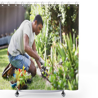 Personality  Rooting Out The Problem. Cropped Shot Of A Handsome Young Man Gardening. Shower Curtains