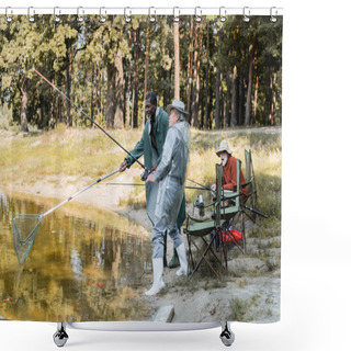 Personality  Multiethnic Senior Men With Fishing Rod And Net Standing Near Friend And Lake  Shower Curtains