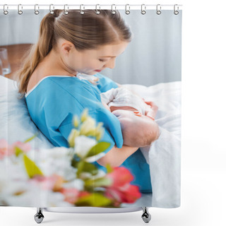 Personality  Side View Of Smiling Young Mother Breastfeeding Newborn Baby On Bed In Hospital Room  Shower Curtains
