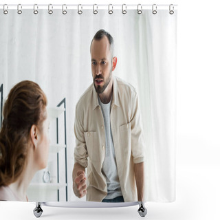 Personality  Selective Focus Of Angry Man Showing Fist While Looking At Wife At Home  Shower Curtains