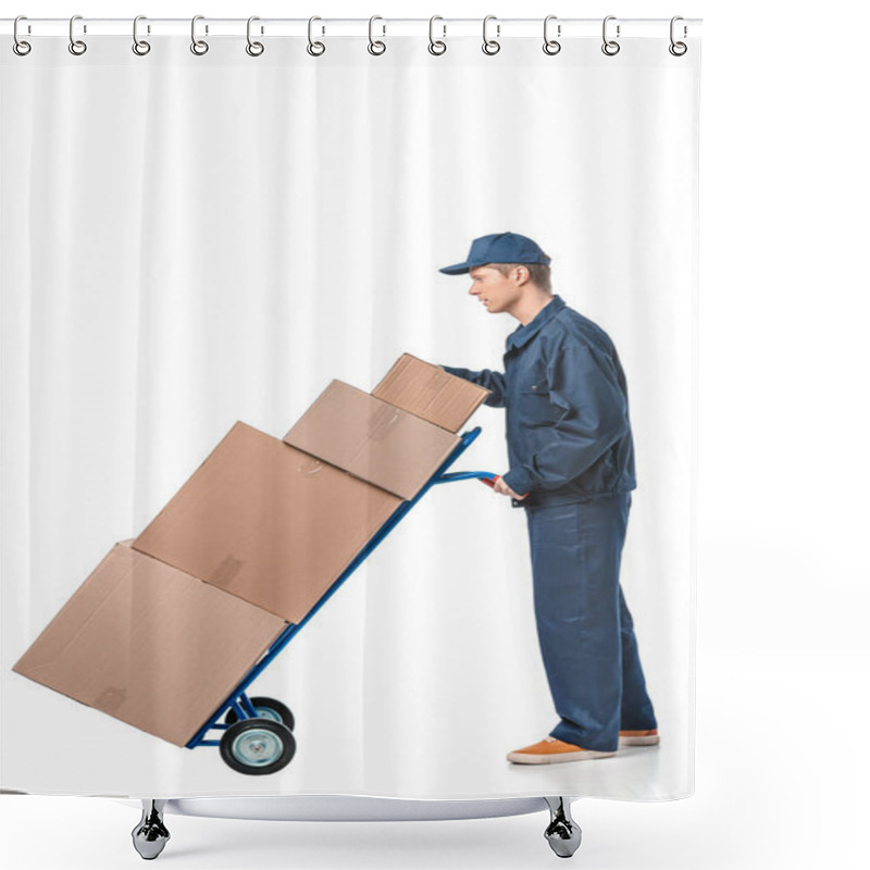 Personality  mover in uniform transporting cardboard boxes on hand truck isolated on white with copy space shower curtains