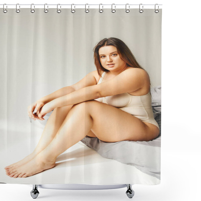 Personality  Full Length Of Charming Woman With Plus Size Body And Bare Feet Wearing Beige Bodysuit And Looking At Camera While Sitting On Bed With Grey Bedding, Body Positive, Figure Type  Shower Curtains