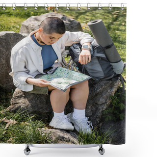 Personality  Young Short Haired And Tattooed Female Hiker Looking At Map While Sitting Near Backpack With Fitness Mat On Stone With Blurred Nature At Background, Confident Explorer, Translation Of Tattoo: Love Shower Curtains