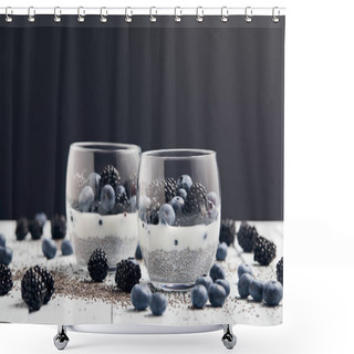Personality  Selective Focus Of Yogurt With Chia Seeds And Berries In Glasses Near Scattered Seeds, Blueberries And Blackberries On White Table Isolated On Black Shower Curtains
