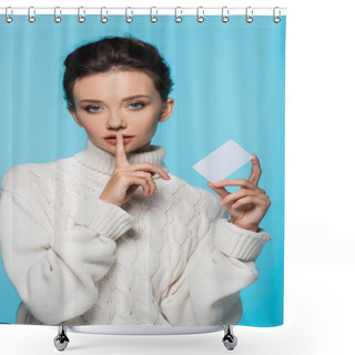 Personality  Young Model In Knitted Sweater Holding Blank Card And Showing Secret Gesture Isolated On Blue Shower Curtains