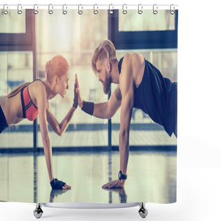 Personality  Side View Of Young Sportsman And Woman Doing Plank Exercise And Giving High Five Shower Curtains