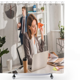 Personality  Attractive Businesswoman Holding Paper Plane And Sitting Near Laptop With Coworker On Background, Procrastination Concept Shower Curtains