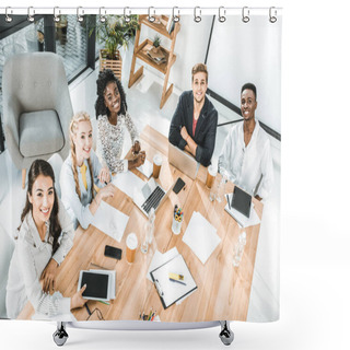 Personality  High Angle View Of Multicultural Group Of Business People Looking At Camera While Sitting At Table In Conference Room Shower Curtains