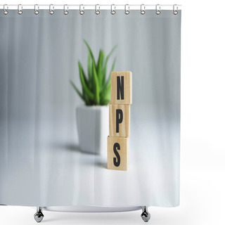 Personality  The Text NPS NET PROMOTER SCORE On Wooden Cubes. Business Concepts. Shower Curtains